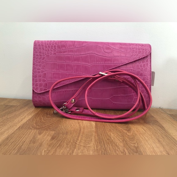 Danier Handbags - Danier Embossed Leather purse NWT